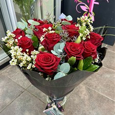 Deluxe Dozen Red Roses in a Glass Vase